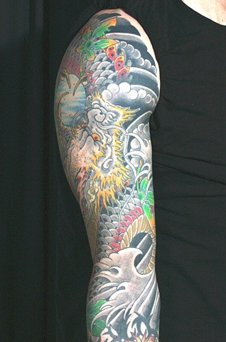 点击大图看下一张：jeff zuck传统的花臂纹身作品图4