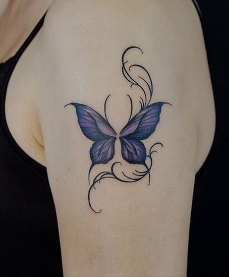 点击大图看下一张：唯美的手臂蝴蝶纹身
