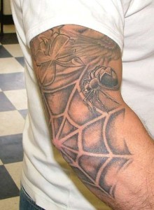 点击大图看下一张：手臂帅气的蜘蛛结网纹身图3