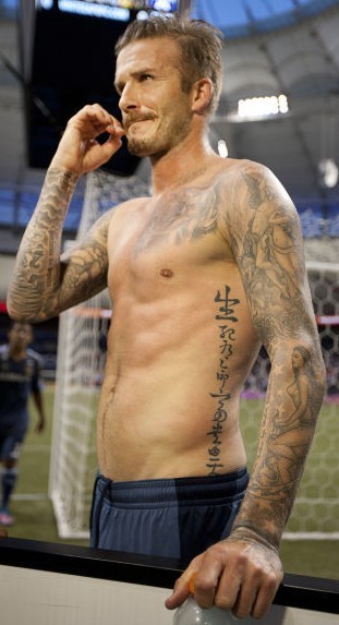 点击大图看下一张:人生的赢家 贝克汉姆纹身写真图6