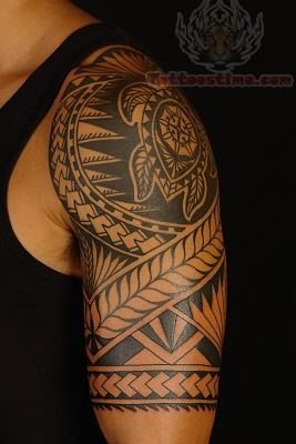 点击大图看下一张：大臂个性时尚的图腾纹身图3