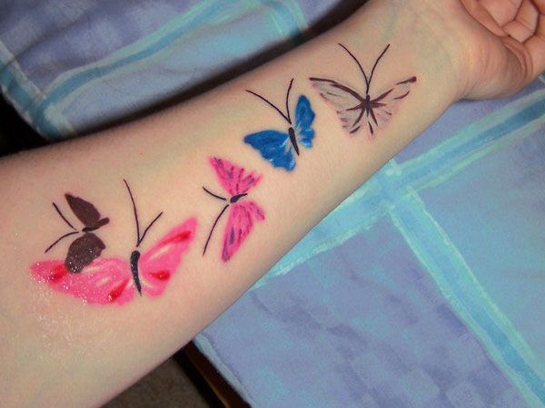 点击大图看下一张：女孩子手臂漂亮的蝴蝶纹身图案图2