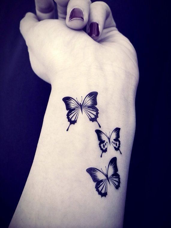点击大图看下一张：女孩子手臂漂亮的蝴蝶纹身图案图3