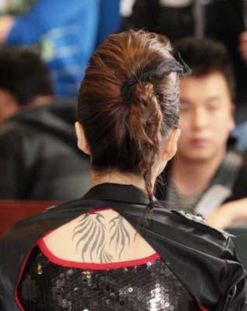 点击大图看下一张：快乐女声刘忻个性纹身图5