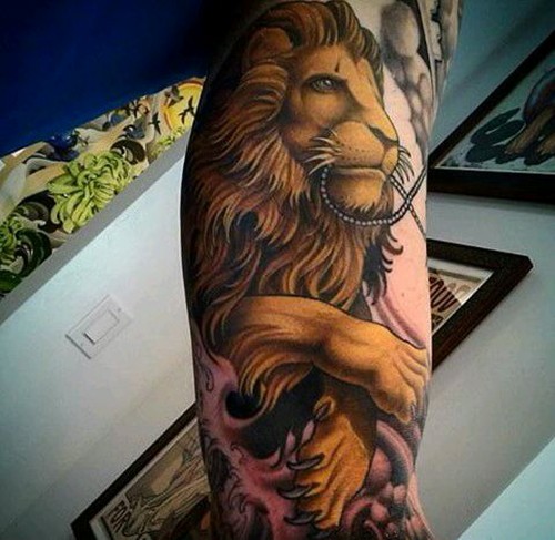 点击大图看下一张：手臂上霸气的狮子头纹身图4