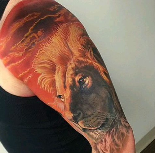 点击大图看下一张：霸气狮子头手臂纹身