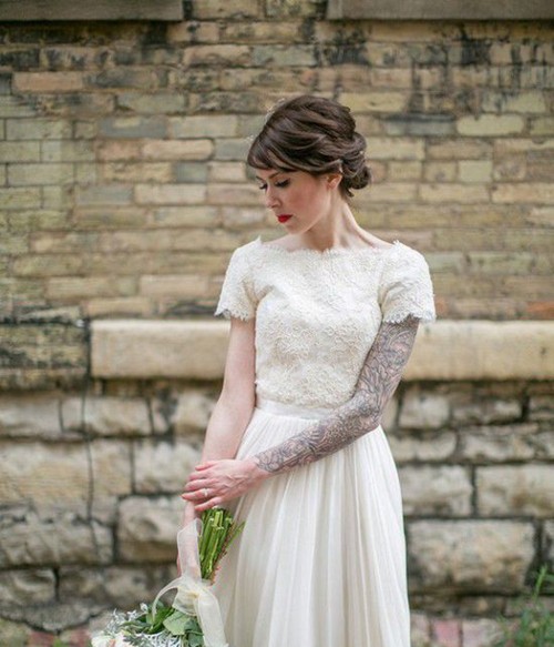 点击大图看下一张：穿婚纱的纹身女孩图7