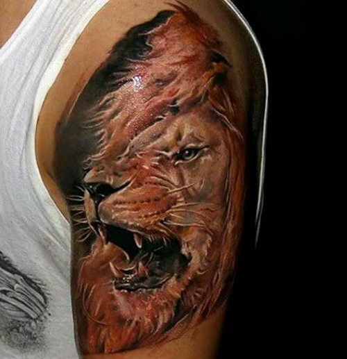 点击大图看下一张：手臂上威猛霸气的唐狮纹身图6