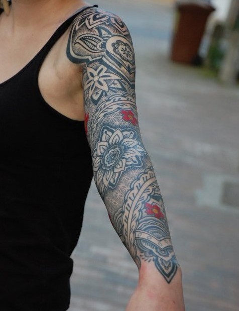 点击大图看下一张：德国纹身师GERD经典图腾花臂纹身