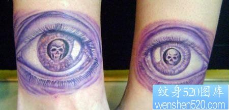 点击大图看下一张：纹身520图库：情侣手腕眼睛骷髅纹身图片
