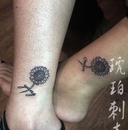 点击大图看下一张:腿部情侣向日葵纹身图片