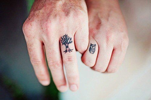 点击大图看下一张：情侣手指上的小清新纹身图3