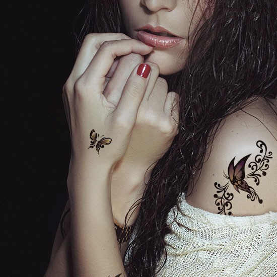 点击大图看下一张：漂亮的蝴蝶女生肩部纹身图5