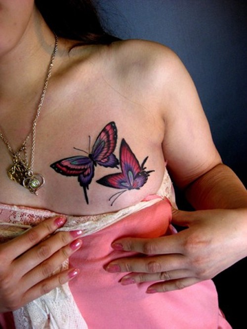 点击大图看下一张：美女胸部个性纹身图5