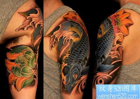 点击大图看下一张：男生手臂漂亮的彩色鲤鱼莲花纹身图片