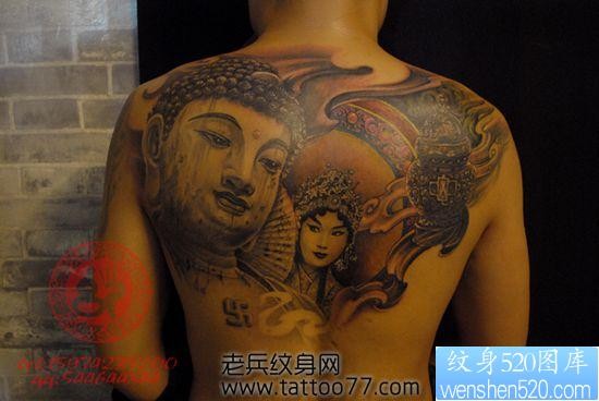 点击大图看下一张：背部经典帅气的佛头花旦纹身图片