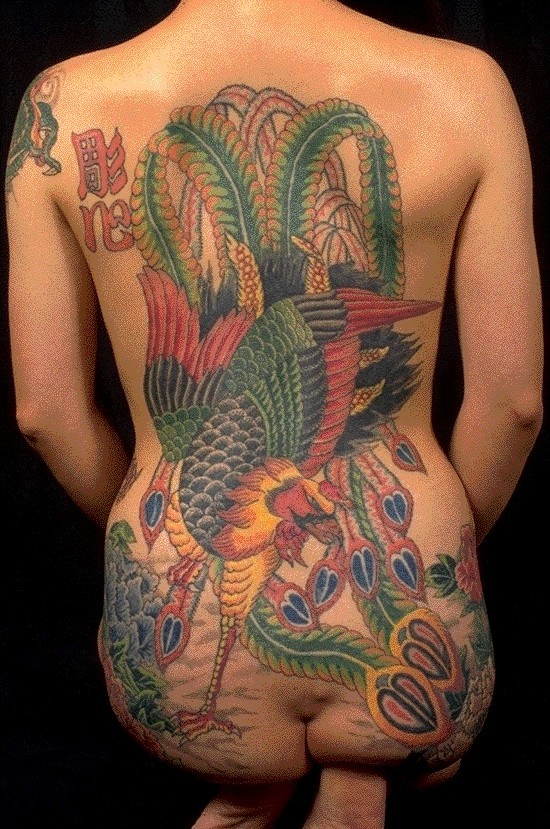 点击大图看下一张：日本黑社会女老大  全裸纹身图片图9