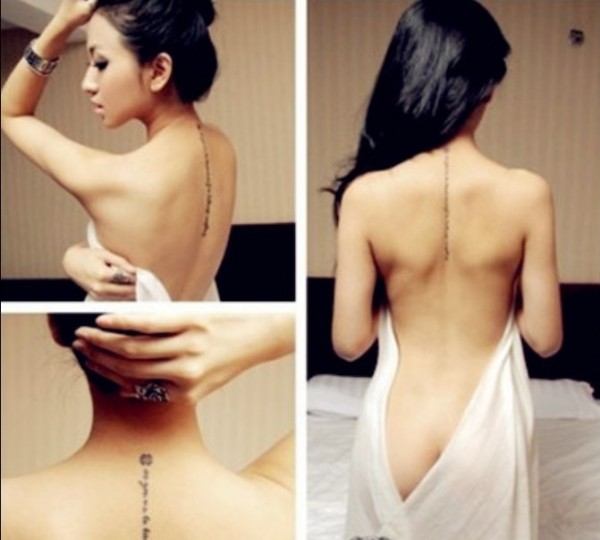 点击大图看下一张：女性裸背脊柱独特英文时尚刺青