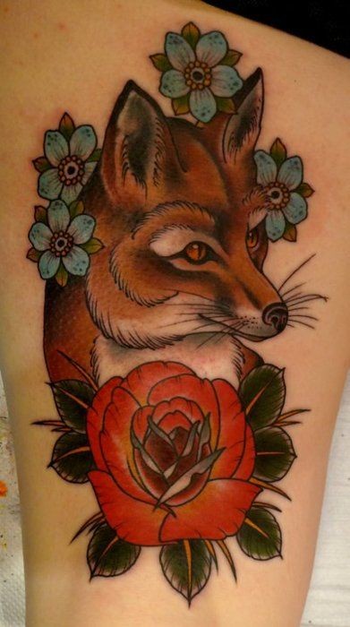点击大图看下一张：腿部个性狐狸花朵纹身