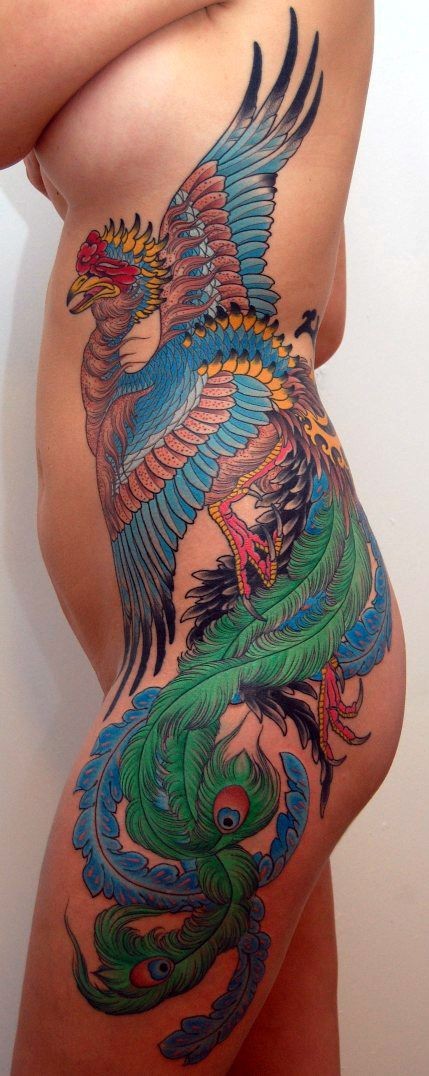 点击大图看下一张：女性腰部个性的凤凰纹身