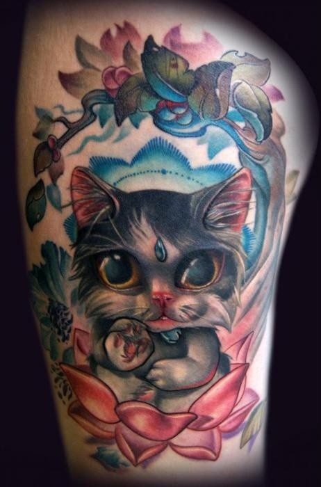 点击大图看下一张：女性腿部呆萌的猫咪纹身