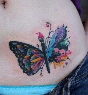 点击大图看下一张：视觉效果震撼的蝴蝶形抽象彩色纹身图案