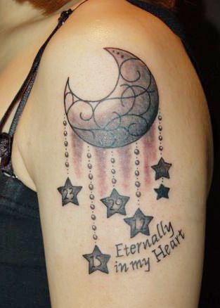 点击大图看下一张：月亮星星吊坠纹身图案