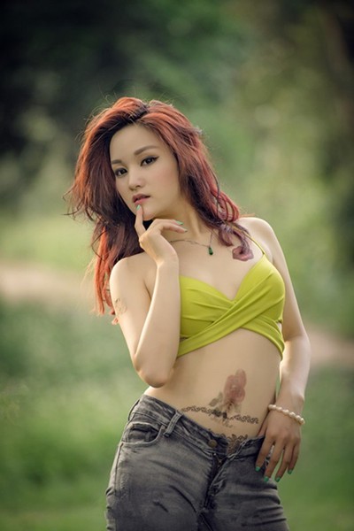 点击大图看下一张：性感妖娆女性腰部纹身图7