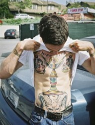 肌肉男胸膛艺术肖像纹身图片