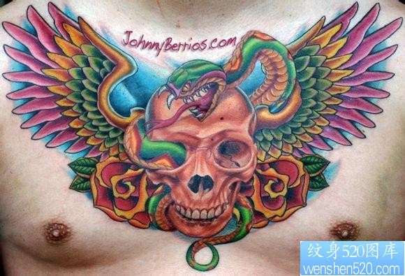 点击大图看下一张:男生前胸霸气外漏的骷髅翅膀纹身图片