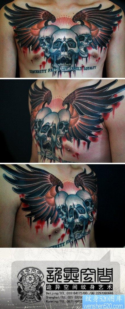 点击大图看下一张：男生胸前一张很酷霸气的骷髅与翅膀纹身图片