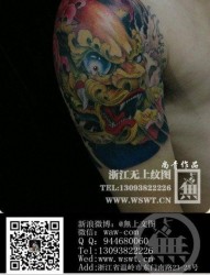 男生手臂很帅经典的唐狮子纹身图片