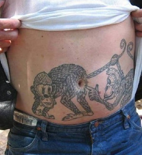 点击大图看下一张：男士腹部经典有趣的纹身