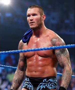 点击大图看下一张：最年轻的WWE世界重量级冠军：兰迪奥顿的纹身图2