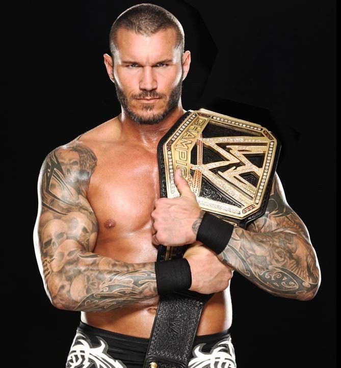 点击大图看下一张：最年轻的WWE世界重量级冠军：兰迪奥顿的纹身图4