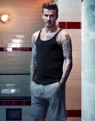 点击大图看下一张:不老帅哥贝克汉姆的纹身图3