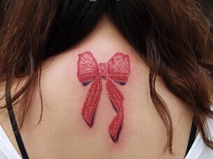点击大图看下一张：清新唯美的蝴蝶结纹身图5