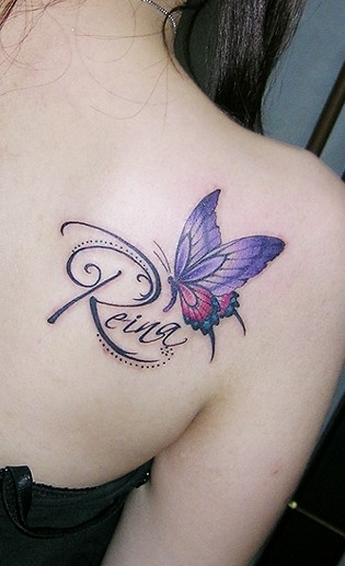 点击大图看下一张：女生喜爱的蝴蝶纹身