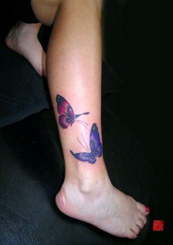 点击大图看下一张：漂亮唯美的脚踝蝴蝶刺青