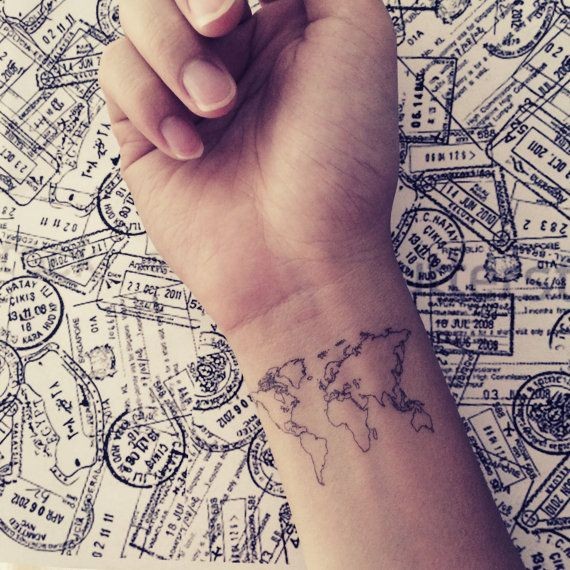 点击大图看下一张：在手腕处纹身地图带你走遍世界各地