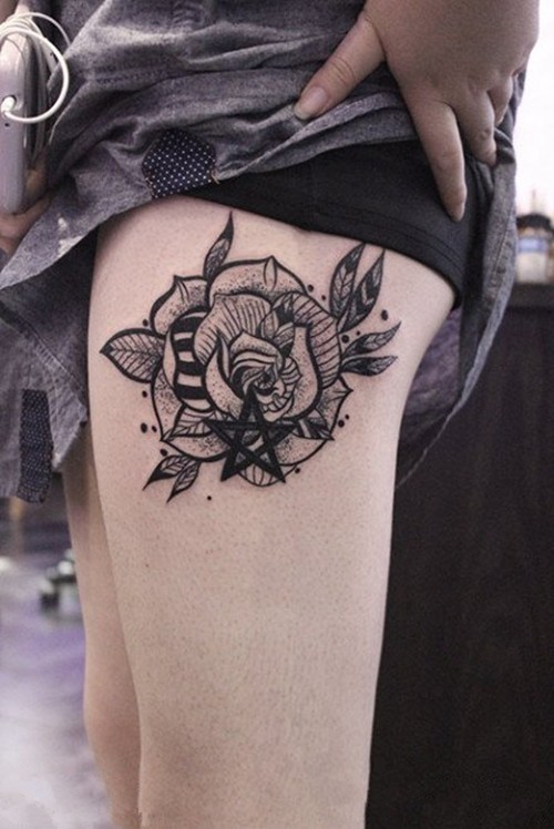点击大图看下一张：女生大腿诱惑花朵纹身