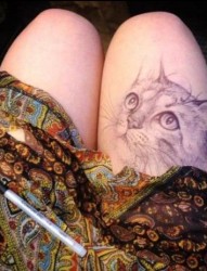 可爱的猫咪女生大腿纹身