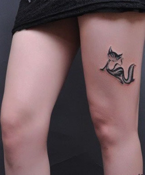 点击大图看下一张：可爱的猫咪女生大腿纹身图4