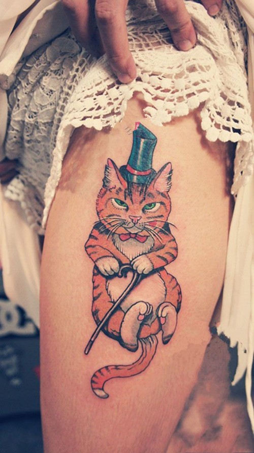 点击大图看下一张：可爱的猫咪女生大腿纹身图6