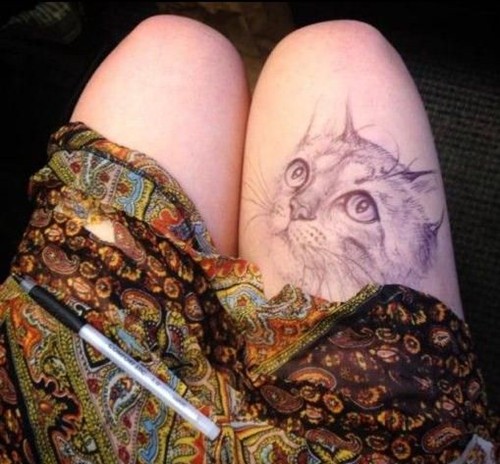 点击大图看下一张：可爱的猫咪女生大腿纹身图7