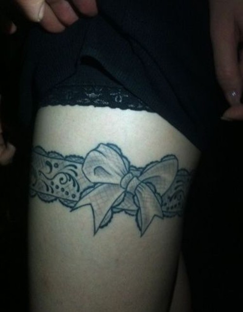点击大图看下一张：漂亮的蝴蝶结女生大腿纹身