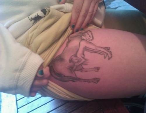 点击大图看下一张：小动物女生大腿纹身图5