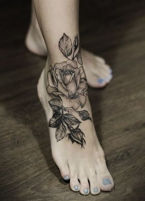 点击大图看下一张：漂亮的花朵女生脚部纹身图2