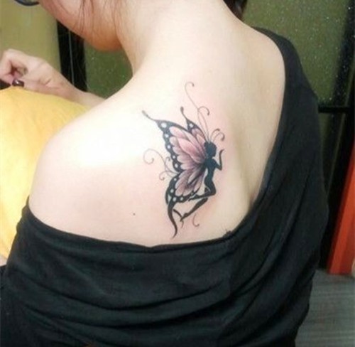 点击大图看下一张：女生后背的翩翩蝴蝶纹身图5