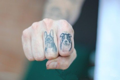 点击大图看下一张：可爱小动物女生手指纹身